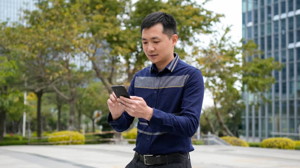 istock Business people are using mobile phones 1473837019