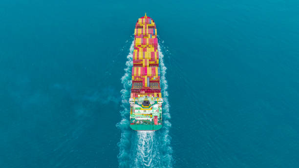 istock Cargo container Ship, cargo maritime ship with contrail in the ocean ship carrying container and running for export concept technology freight shipping sea freight by Express Ship 1473837644