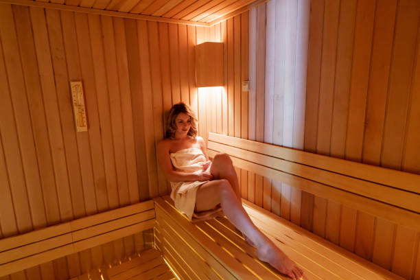 istock Woman relaxing in sauna 1473842026