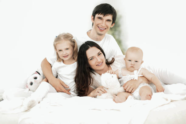 istock background image of a happy young family 1473845523