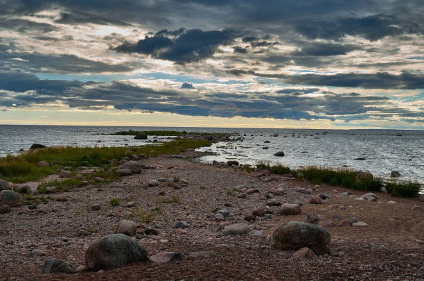 istock Rocky spit stretching out to sea under a dramatic sky 1473846304