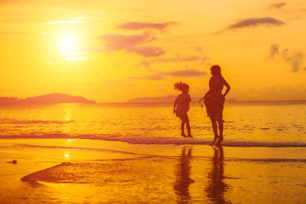 istock mother child at sunset 1473849863