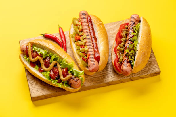istock Various hot dog on wooden board 1473854932