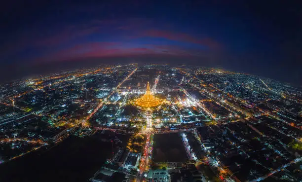 Photo of Spectacular aerial view of Phra Pathom Chedi at twilight.