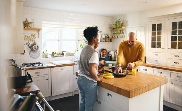 istock Boy with Down syndrome making pancakes for breakfast with parents 1473857514