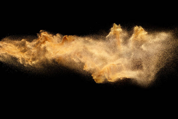 istock Dry river sand explosion.Brown color sand splash against black background. 1473862523