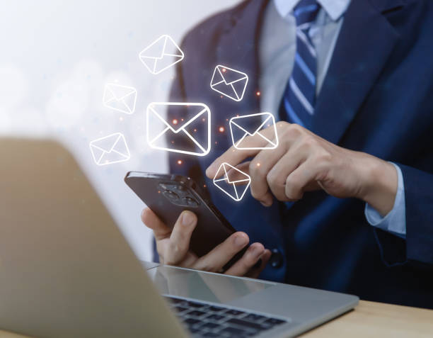 istock Businessman sending e-mail from smartphone, sending and receiving data or messages with digital technology. 1473862717