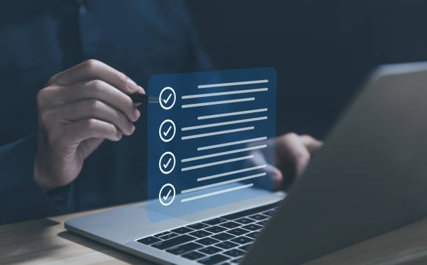 istock Businessman check mark shown on virtual screen. checklist ideas on a list 1473862742