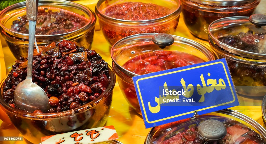 Piles of various colorful tasty candy sweets on bazaar for sale in iranian street market Bazaar Market Stock Photo