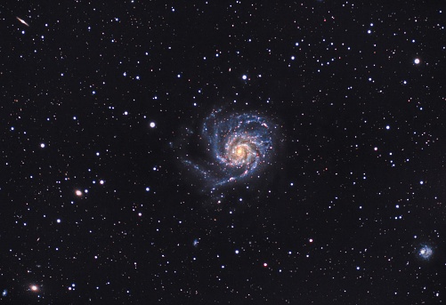 The Pinwheel Galaxy is a face-on spiral galaxy distanced 21 million light-years away from Earth in the constellation Ursa Major.