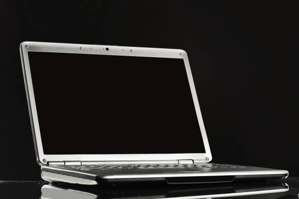 istock close up. stylish notebook with blank black screen .photo with copy space 1473865052