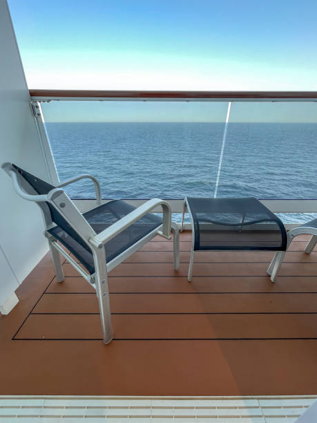 istock Seat and table on ship balcony at sea 1473867342