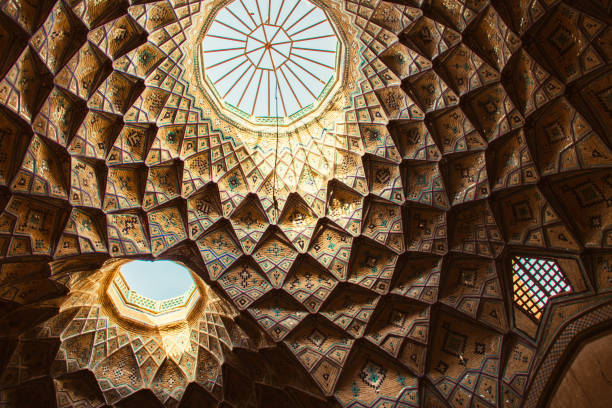 istock Kashan, Iran - 10th june, 2022: Beautiful dome interior in iranian islamic building 1473867795