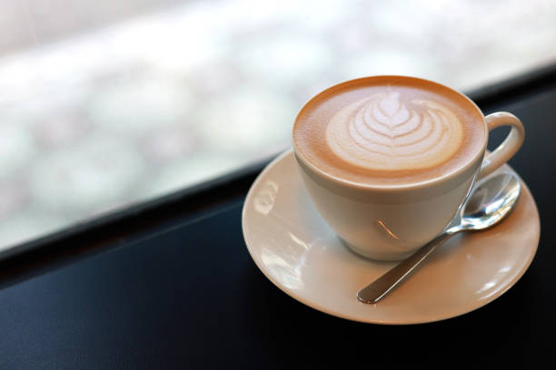 istock A cup of cappuccino latte on table 1473868061