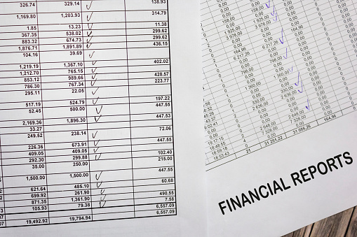 Close up financial statement report, monthly book, bank account, savings book, saving money