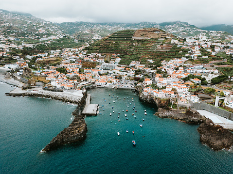 Drone shots of historic fishing village Câmara de Lobos in Madeira