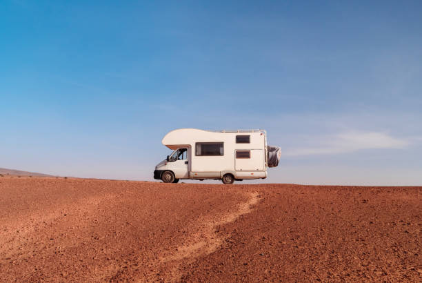istock motor home in countryside on blue sky 1473876218