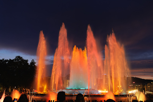 Colors of Magic Fountain of Montjuïc in Barcelona's Plaça d'Espanya, - Spain