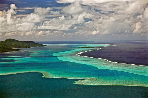 Lakshadweep Union Territory, India: Cherbaniani Reef, aka Beleapani Reef (Malayalam: Valiyapanniyam), coral atoll in the Amindivi islands group - coral reef that encloses the lagoon with three small islands, there is a mosque in the north island - aerial view - Laccadive Sea.