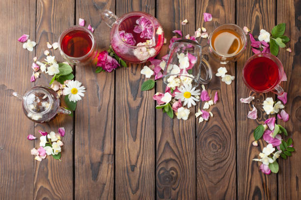 istock various teas with herbs and flowers on a dark wooden table, top view 1473876842