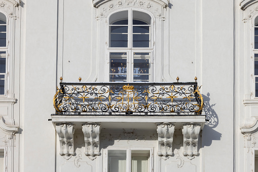 Innsbruck, Austria - February 26, 2023: Hofburg, former Habsburg palace, decorative balcony. It is one of three most significant cultural buildings in the country