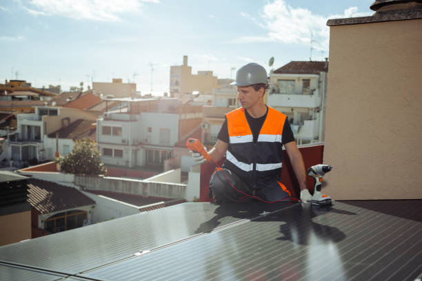 istock Professional engineer worker installing solar panels on a house roof 1473885737