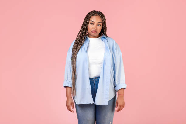 istock Sad Black Overweight Woman Looking At Camera Expressing Frustration, Studio 1473893174