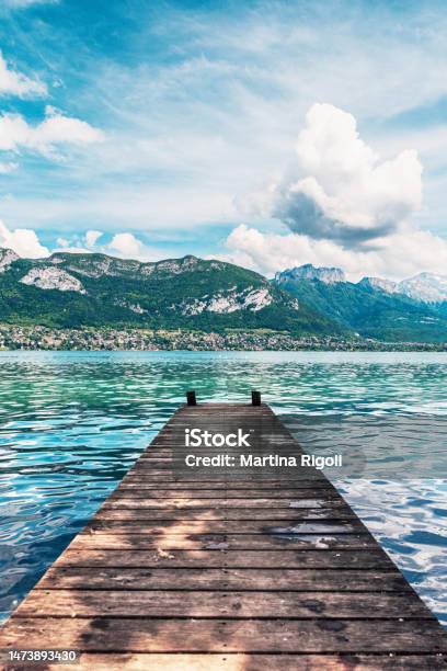 Wooden Jetty Perspective And Beautiful View Of Lake Annecy Stock Photo - Download Image Now