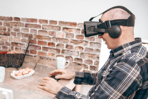 istock Senior man using technology that will open up a world of opportunities 1473897412