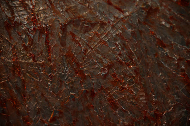 Cracked glass with blood drops or paint closeup Cracked glass with blood drops or paint closeup. Broken glass texture with red drops background the shard close up stock pictures, royalty-free photos & images
