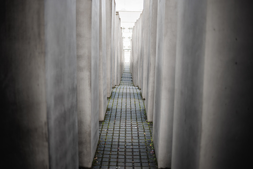 Berlin, Germany - January 13, 2023: Holocaust memorial in Berlin, tall concrete blocks with aisles between