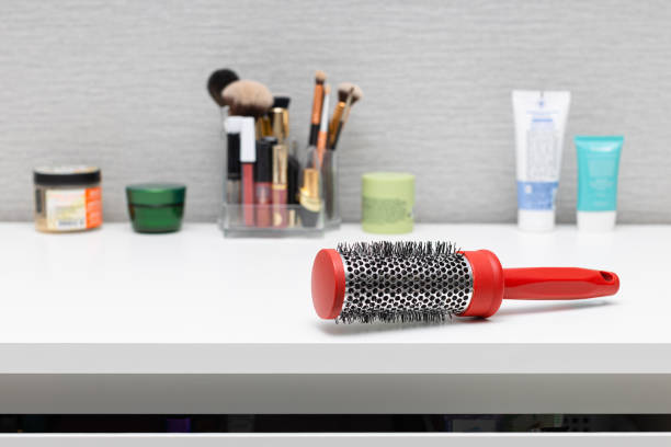 istock an old comb lies on the dressing table. red hair comb. 1473905742