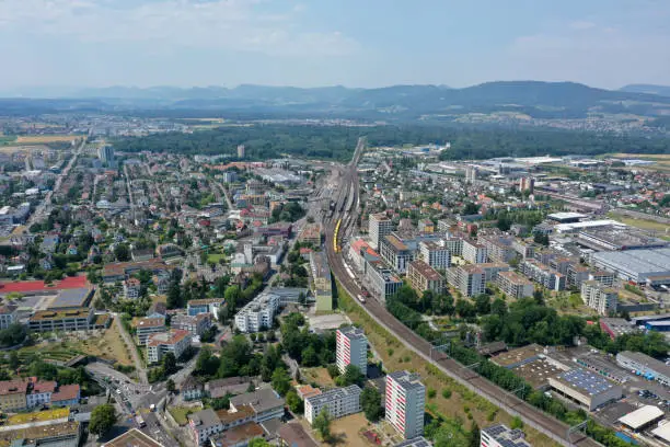 The town of Lenzburg with several modern buildings. Lenzburg as itself has a population of 8'000 citizens (2018). The image was captured during spring season.