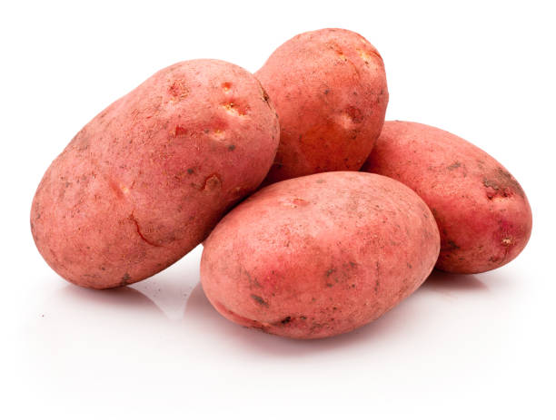 istock Dirty potatoes vegetables isolated on white background 1473907587