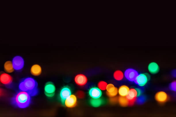 istock Abstract glare circular bokeh background of Christmas light 1473908867