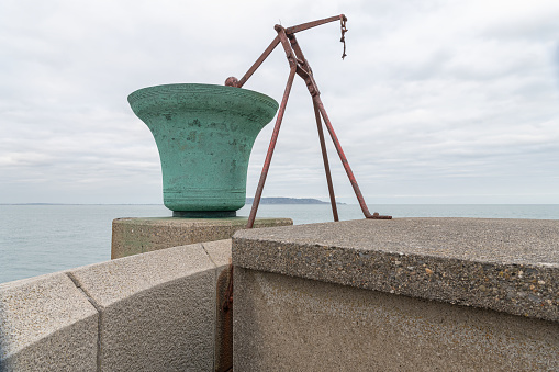 Fog Bell dating from 1852 by the East Pier Harbour Lighthouse, Dun Laoghaire, Ireland