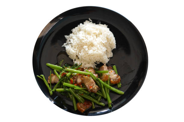 istock Stir Fried Morning Glory, Crispy Pork Belly and Fried Egg 1473912222