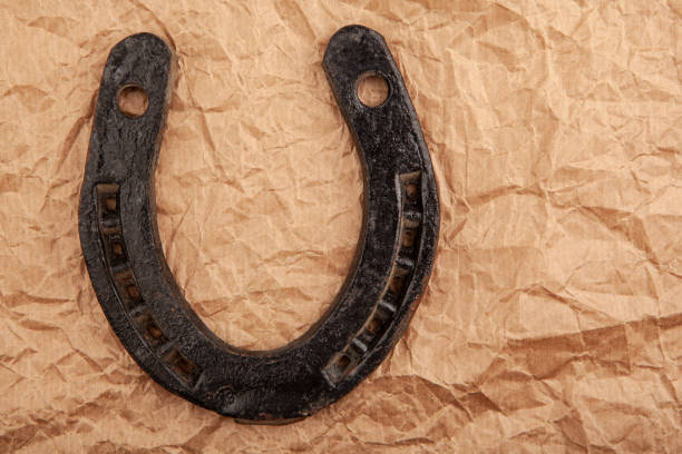 istock image of horseshoe paper background 1473913249