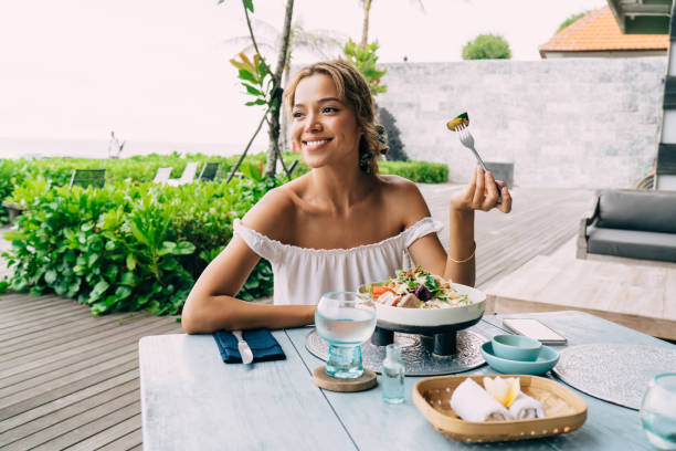 28,400+ Woman Eating Dinner Alone Stock Photos, Pictures & Royalty-Free Images - iStock | Woman eating dinner alone at home, Happy woman eating dinner alone