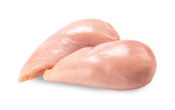 istock Raw chicken meat isolated on white background. 1473923418