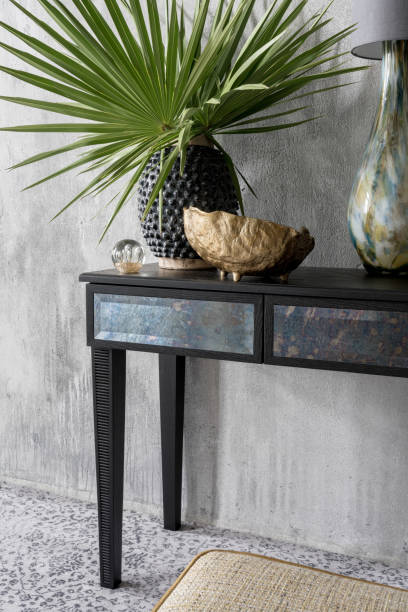 istock Elegant black console table with aesthetic decorations 1473926871