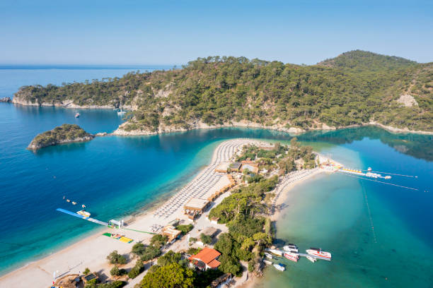 istock Turkey, scenic beach with white sand surrounded blue sea. 1473932887