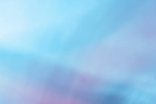 istock abstract background with blue and pink bokeh defocused lights 1473937486