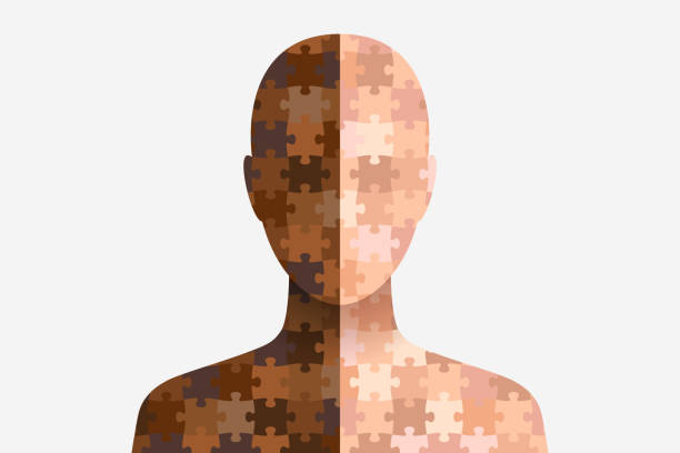 istock Silhouettes with dark and light skin assembled from puzzle pieces 1473940601