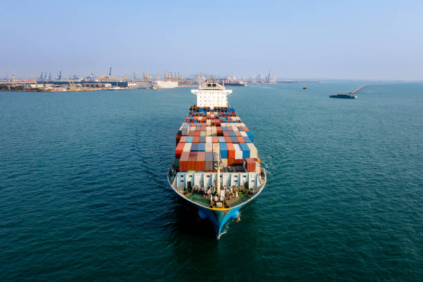 istock Container ship carrying for import and export, business cargo logistic and transportation by container ship in open sea, Aerial view 1473945016