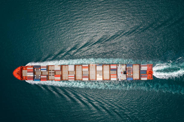 istock cargo container ship full speed sailing in sea import and export business and industry logistic goods transportation of international by container ship in ocean fright 1473945087
