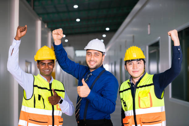 istock success business manager engineer teamwork celebrate for success job construction work of technology refinery warehouse for storage shipping and solar power energy business in industry area 1473949764