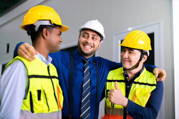 istock success business manager engineer teamwork celebrate for success job construction work of technology refinery warehouse for storage shipping and solar power energy business in industry area 1473949844