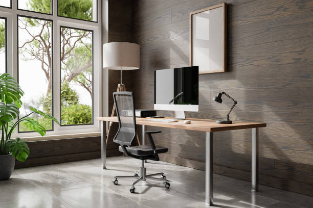 istock comfortable workplace with pc standing on wooden desk in office at home; bright sunlight shines from side through large window; wall; with canvas copy space;  remote work freelance concept; 3D Illustration 1473950973