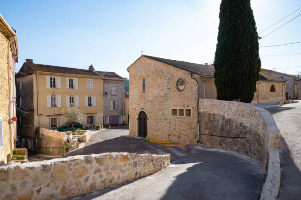View of the church of Sainte Anastasie in the small town of Sainte Anastasie in the Var department, in France stock photo